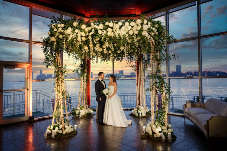 Chuppah with Bride and Groom before Ceremony starts, Hudson River Sunset in the background