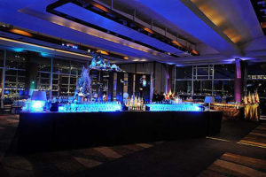 Blue lit holiday cocktail bar