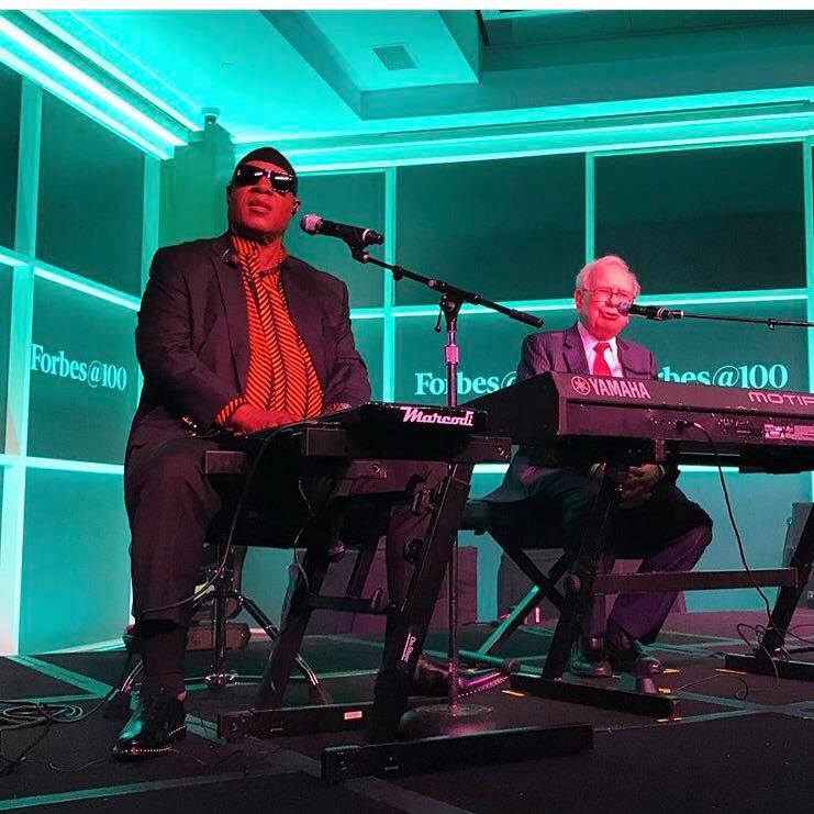 Warren Buffett & Stevie Wonder on stage at Pier Sixty
