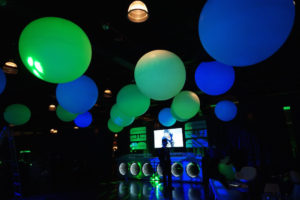 Green and blue round light fixtures added in the room for a mitzvah celebration