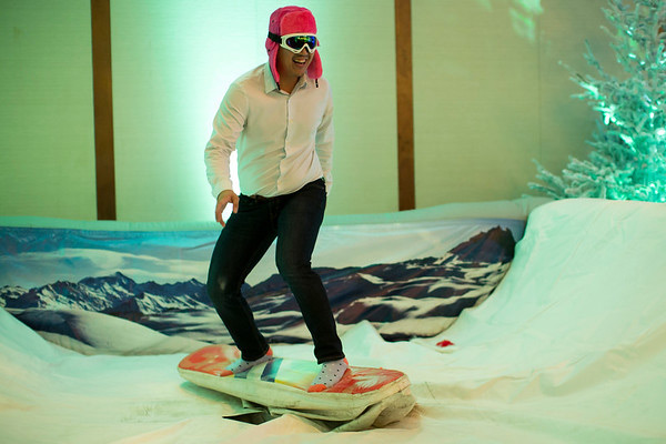 Fun at Pier Sixty for a Holiday Party Set up, man "ice skiing"