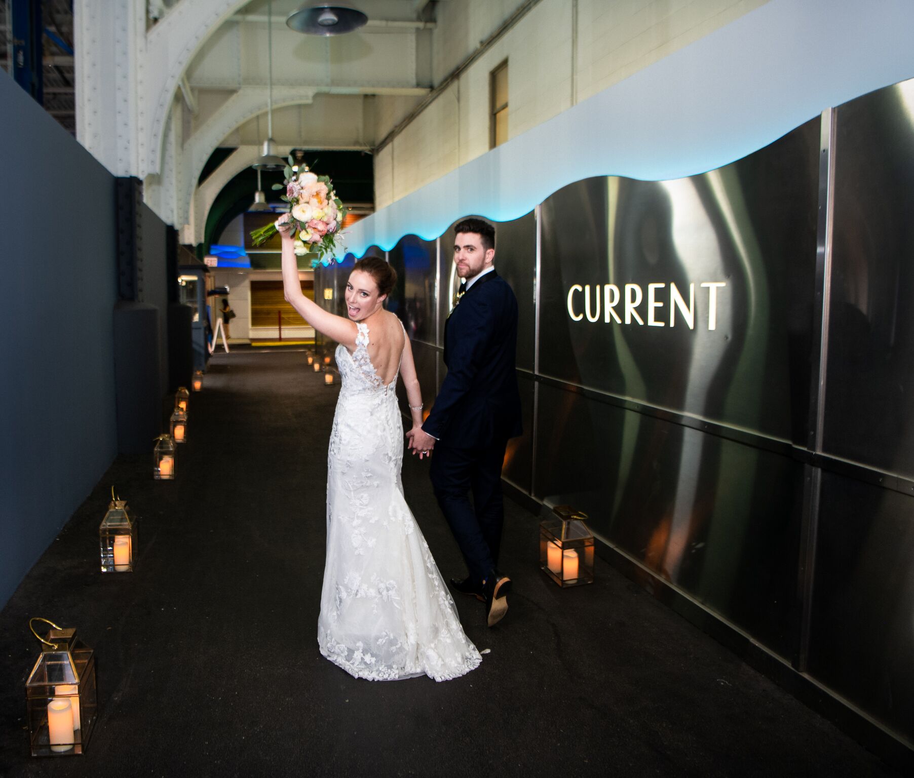 Bride and Groom walking down the Current pedestrian access point