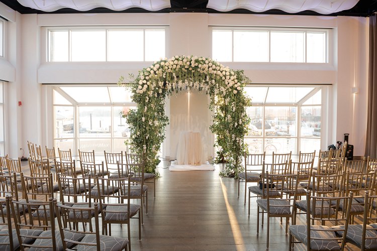 Ceremony Set with a beautiful flower arch up front