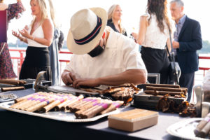 Cigars are being made at a Gala at Pier Sixty